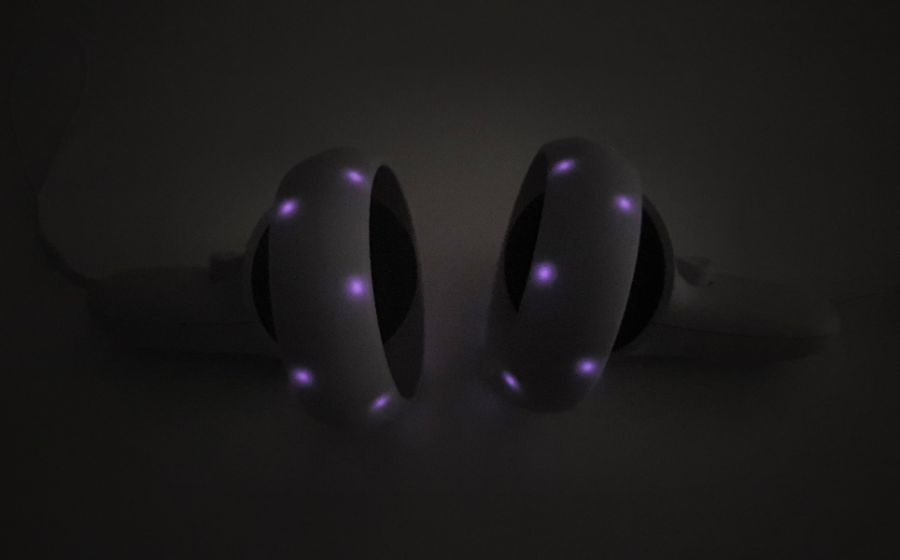 Infrared tracking lights on the rings of the Meta Quest 2 controllers